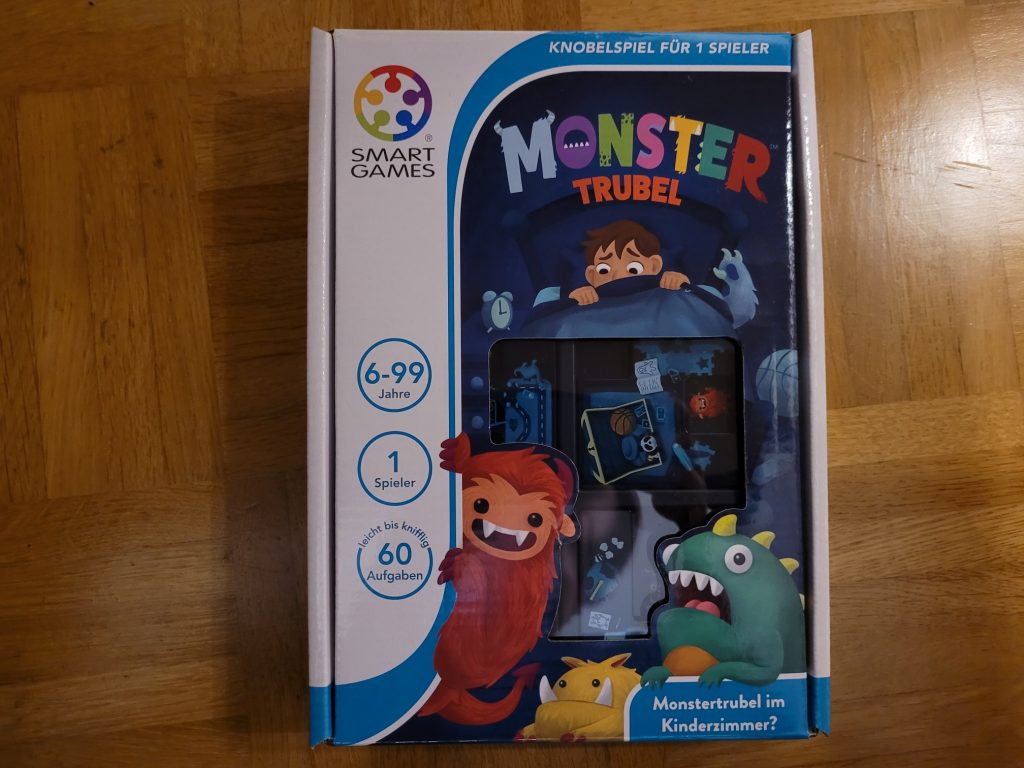 Das Cover von "Monstertrubel" mit Schriftzug und drei bunten, putzigen Monstern.