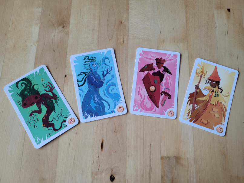 Vier Karten zeigen die vier Geister im Spiel.