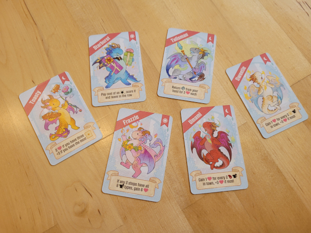 Sechs Karten zeichen verschiedene Schmuckdrachen.
