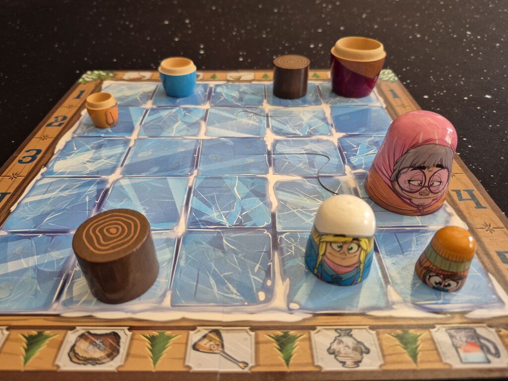 Der Spielplan von "Babushka" mit acht Teilen von Spielfiguren.