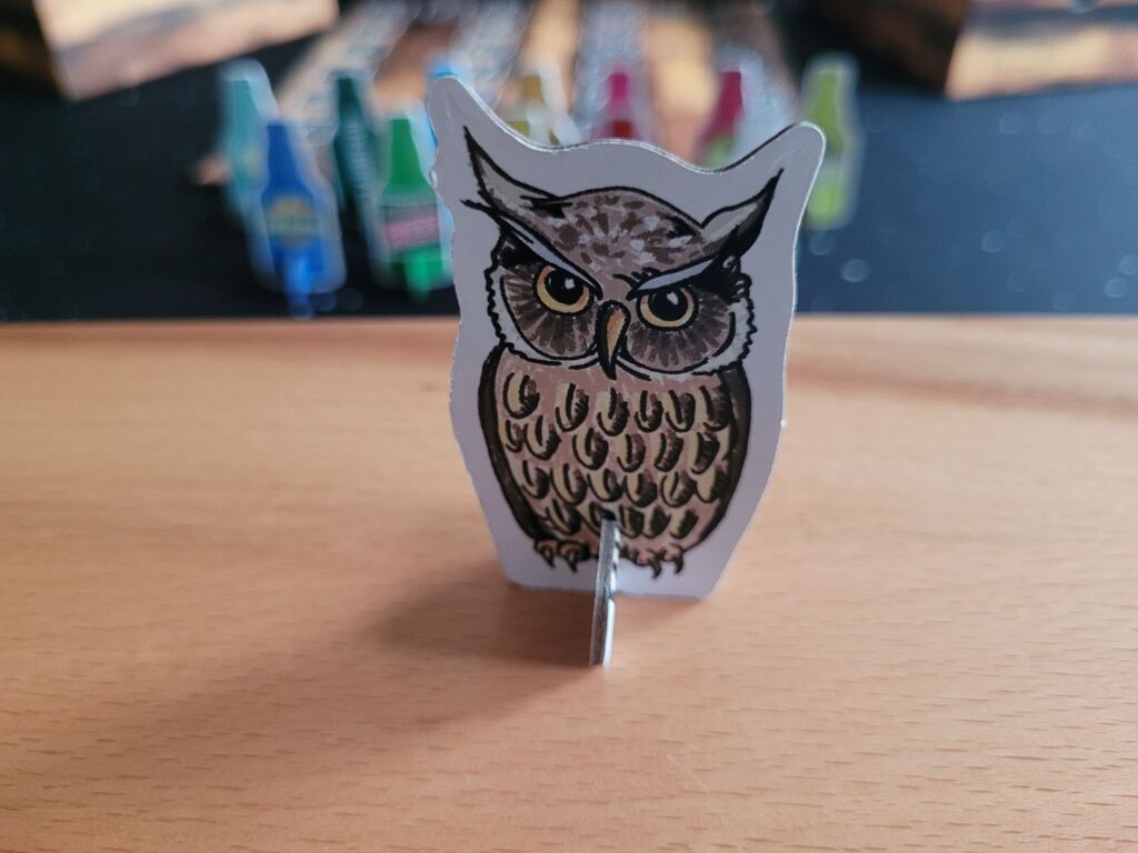 Eine Spielfigur in Form einer Eule.