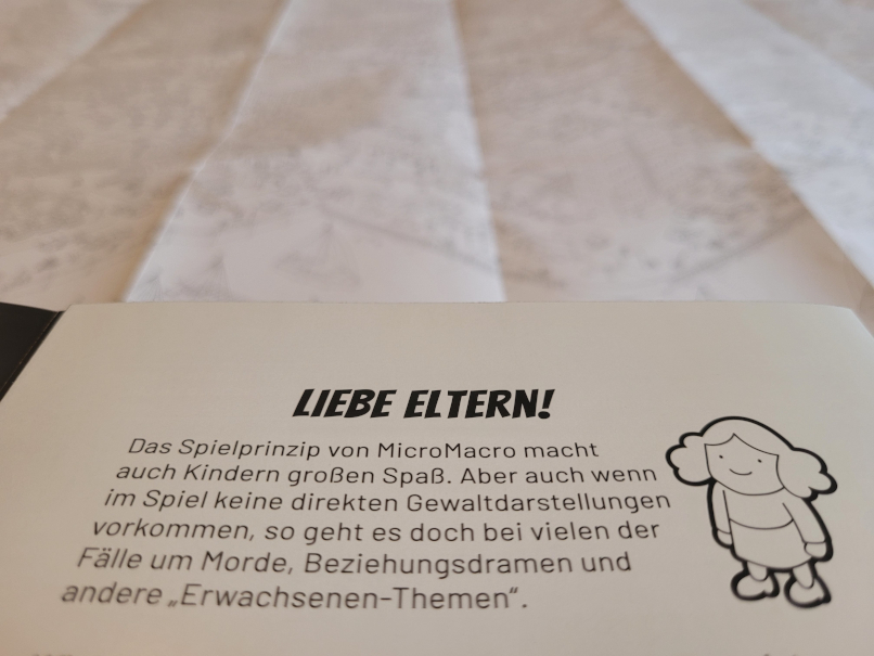 Eine Karte mit Text aus "Micro Macro Crime City".