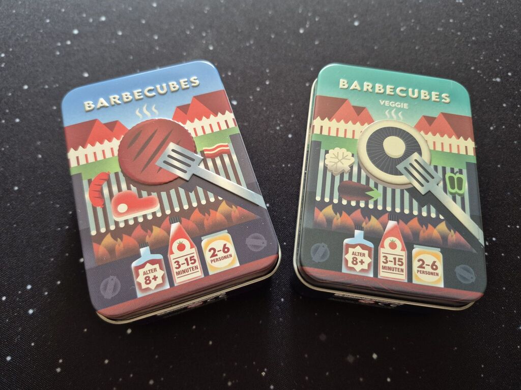 Zwei kleine Dosen mit dem Spiel "Barbecubes".
