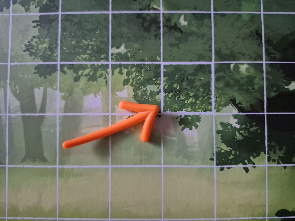 Ein Pfeil zeigt auf ein Feld des Spielertableaus.