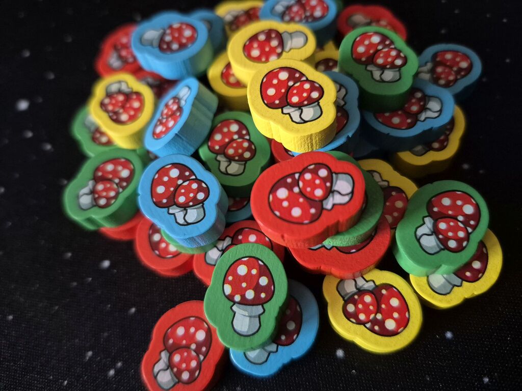 Ein Haufen Pilzmarker in Gelb, Grün, Rot und Blau.