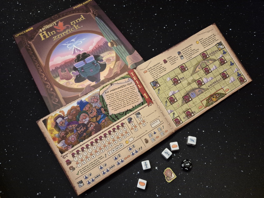 Spielmaterial und das Cover von "Der Hobbit – Hin und zurück".