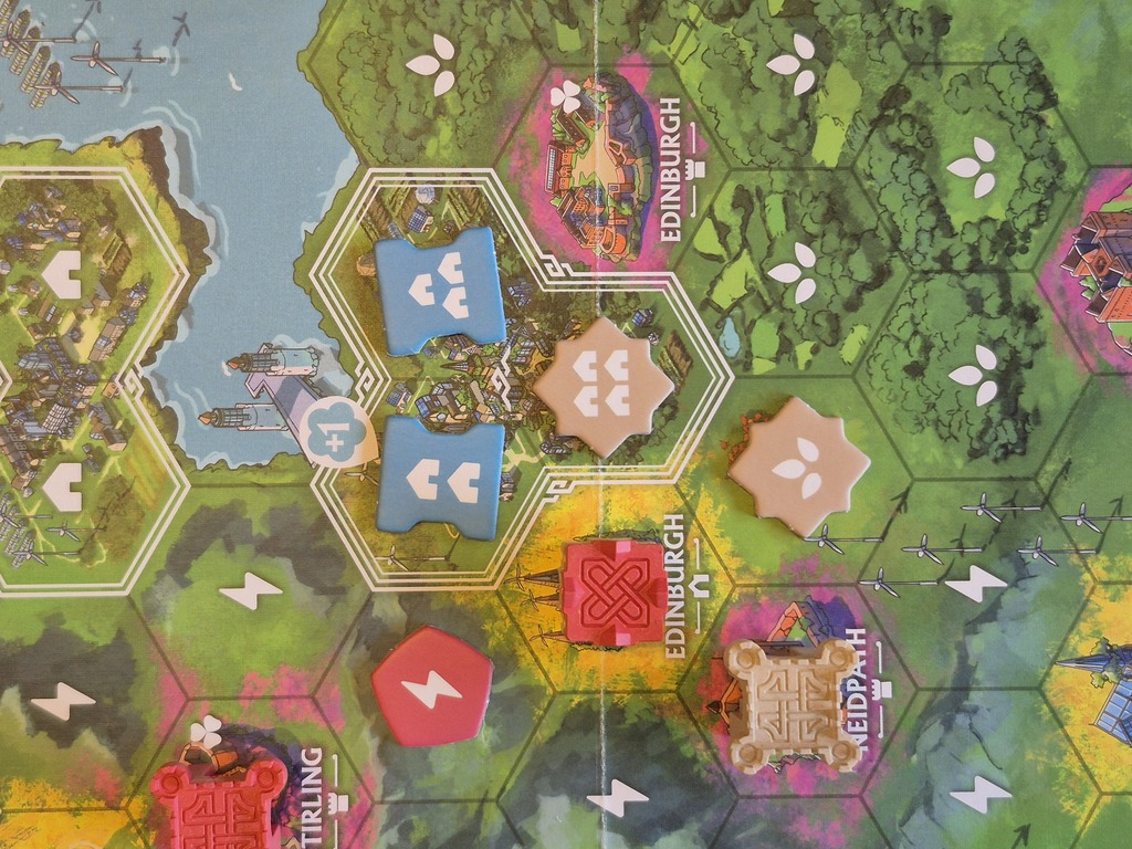 Ein Plättchen mehr beim vorherigen Spielmaterial.