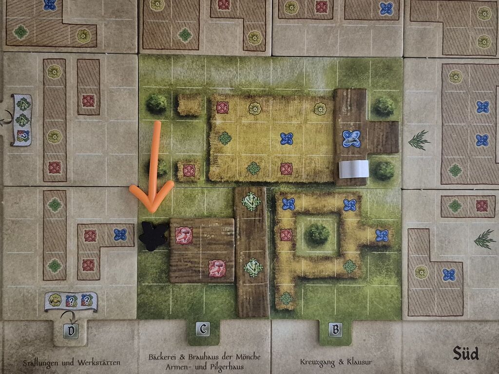 Jetzt liegt auf dem Feld ein Meeple.