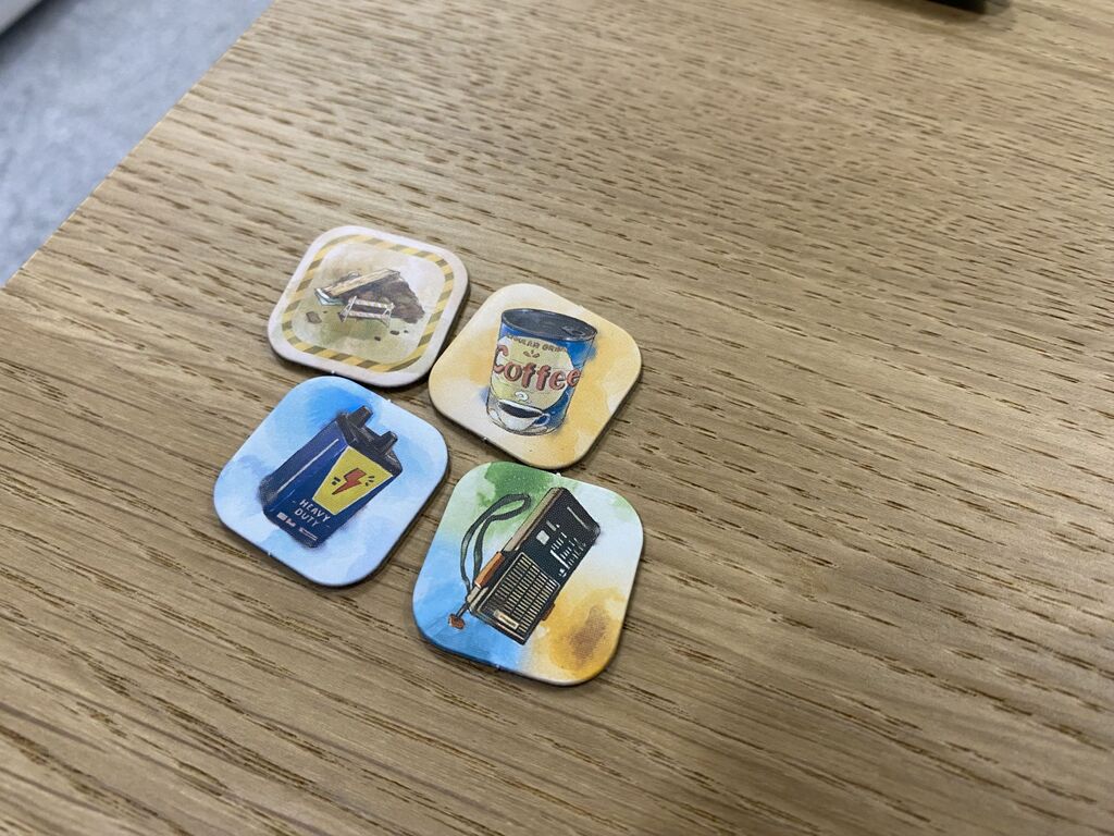 Vier Plättchen aus "E.T. – der Außerirdische".