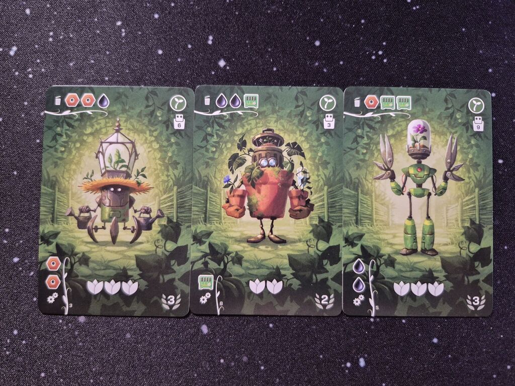 Drei Karten mit Robotern aus "Die letzten Droiden".