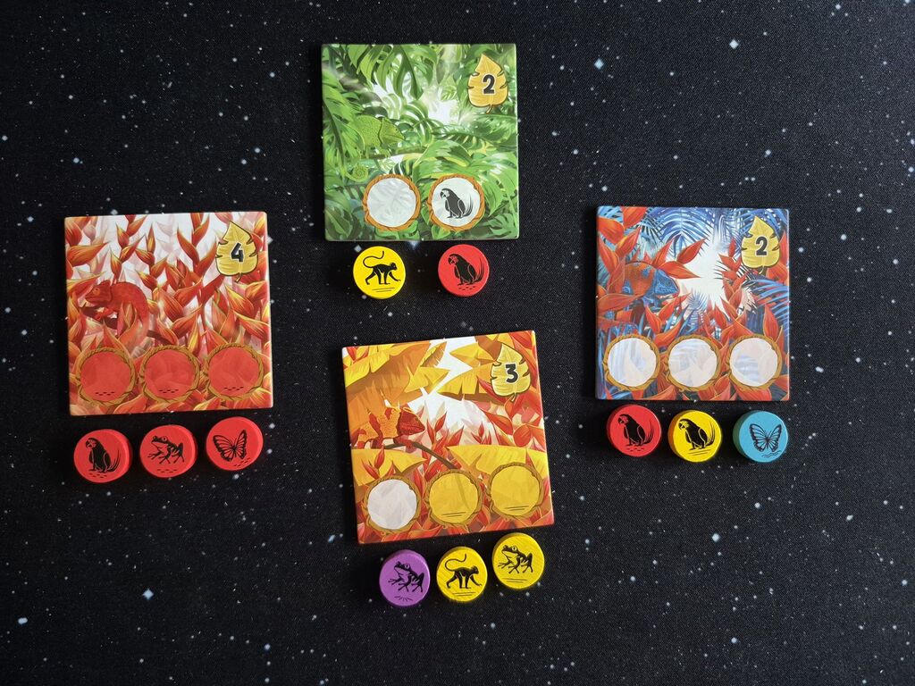 Plättchen und Marker.