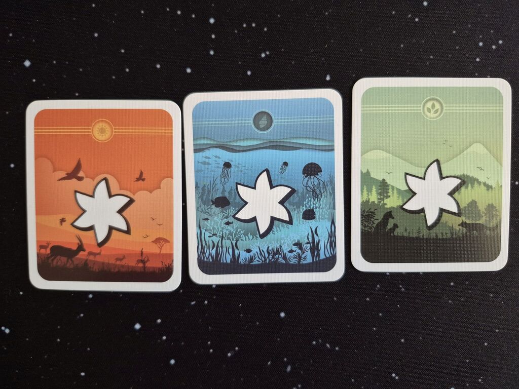 Drei Karten mit einem Stern.