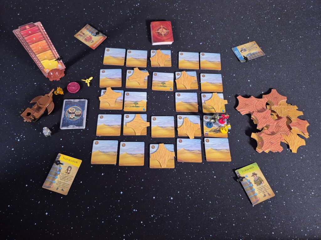 Der Spielaufbau von "Forbidden Desert".