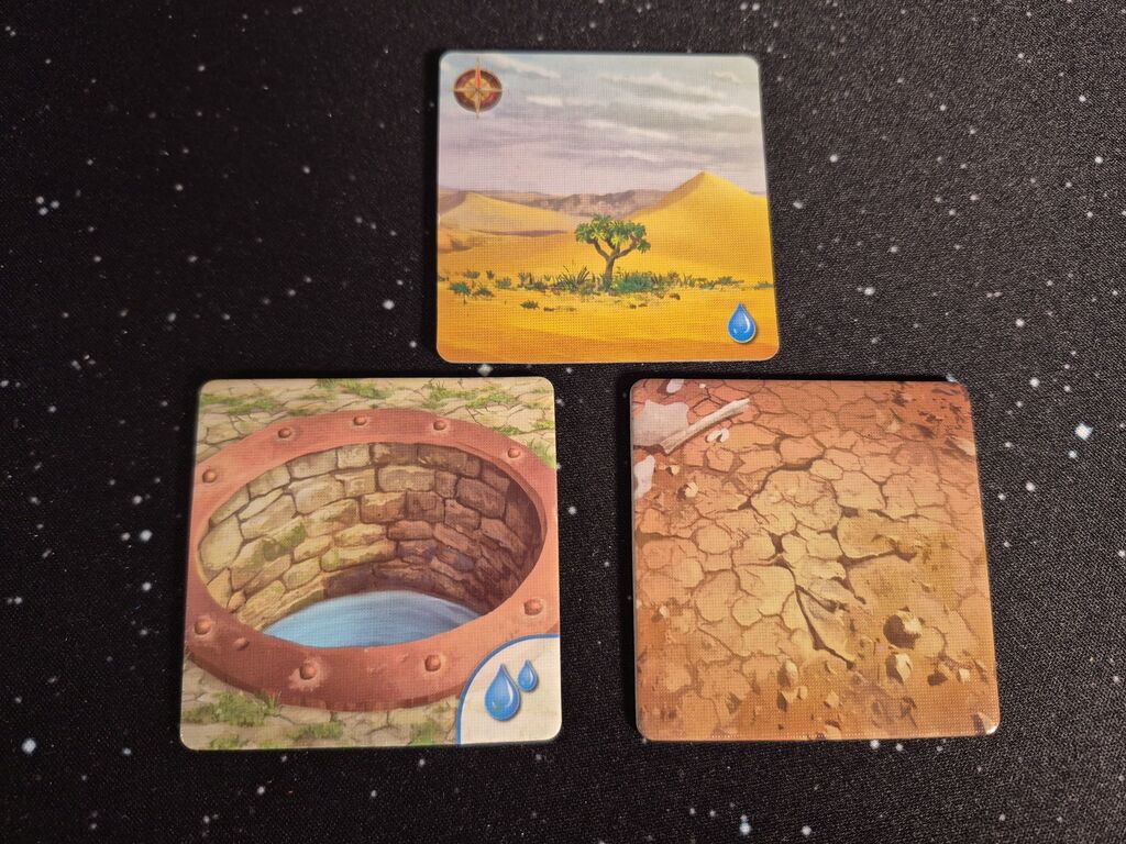 Drei Wüstenplättchen aus "Forbidden Desert".