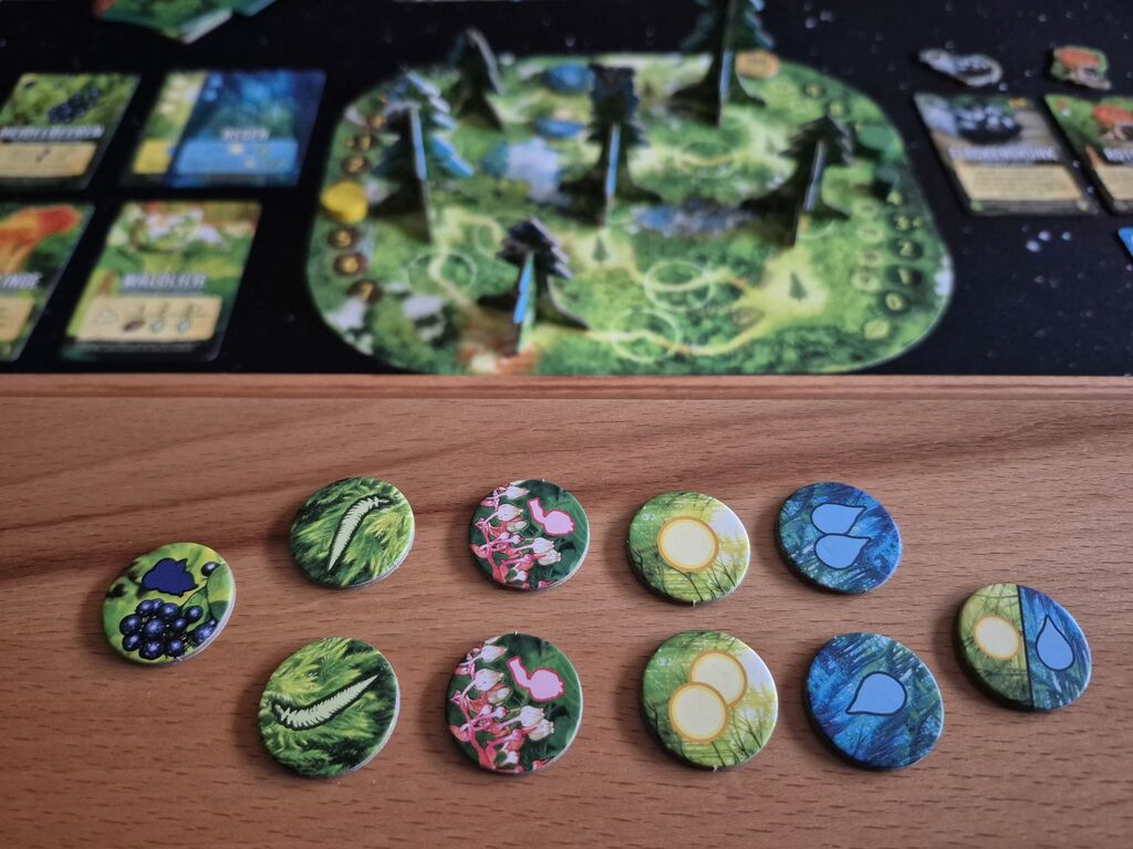 Zehn runde Marker mit Symbolen.