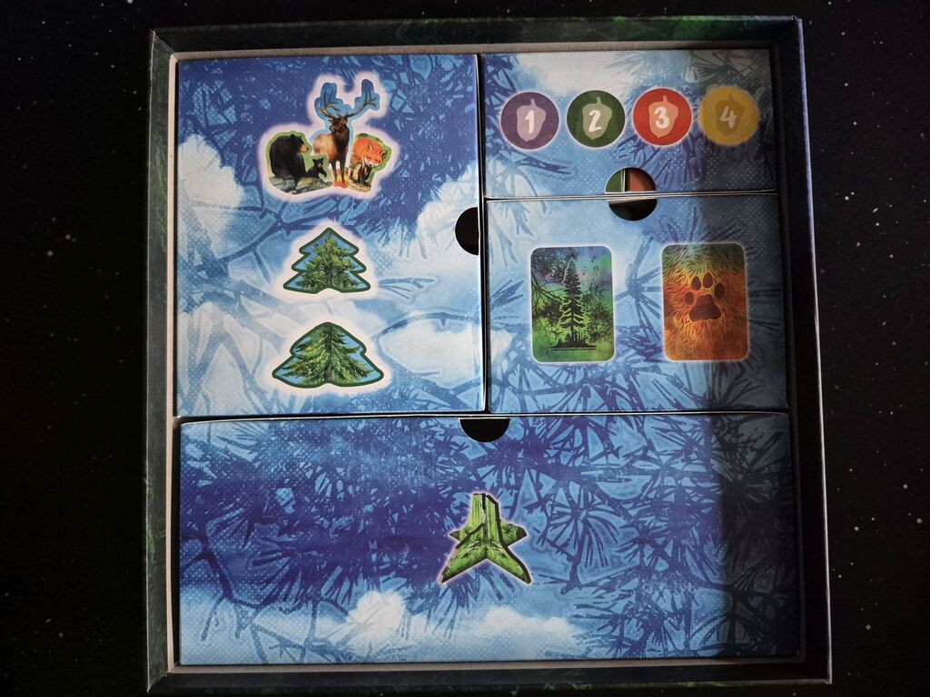 Schachteln fürs Spielmaterial in der Schachtel von "Waldland".