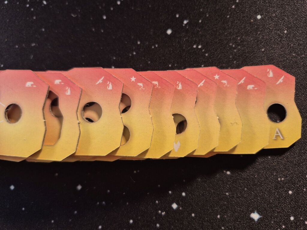 Spielertableaus mit Tiersymbolen.