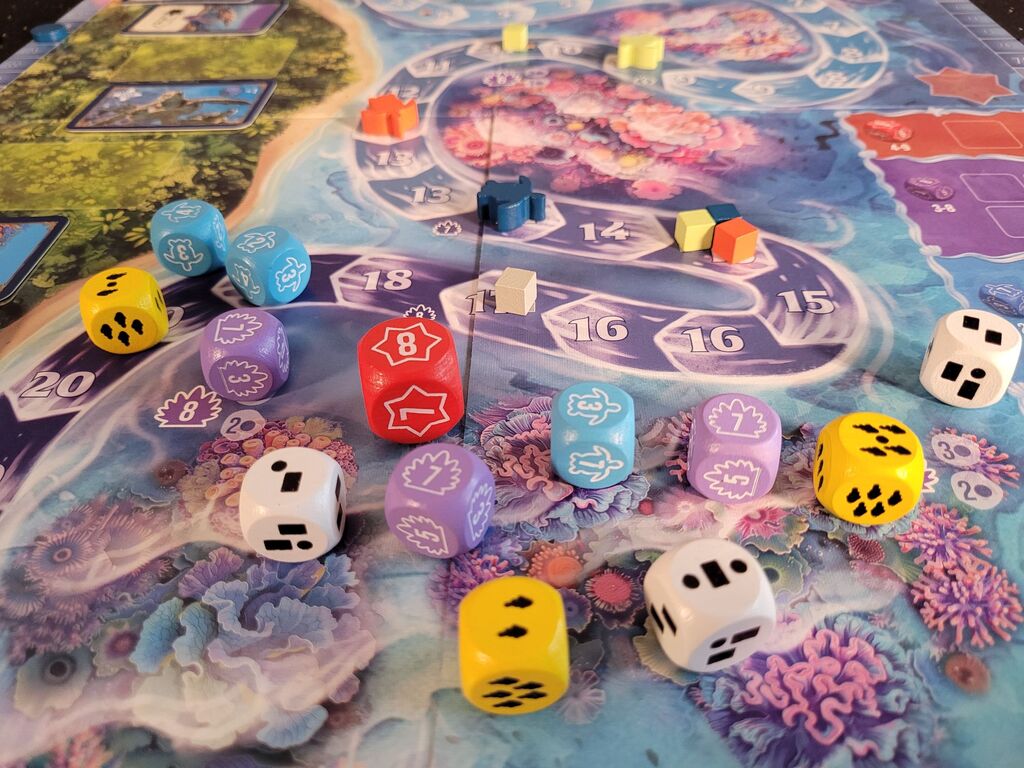 Würfel, FIguren und Marker auf dem Spielplan von "Australis".