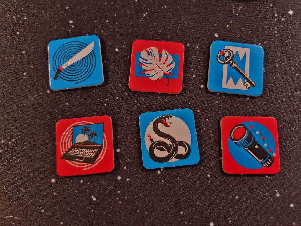 Sechs Plättchen mit je einem Symbol.