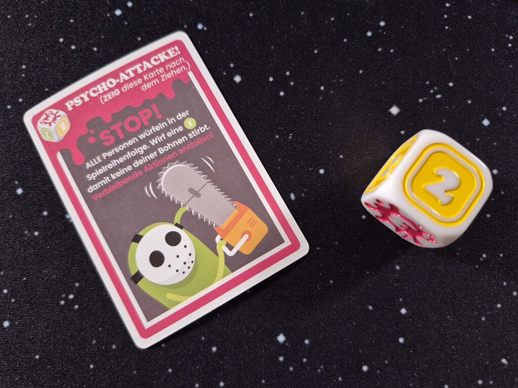 Karte und Würfel aus "Dumb Ways to Die".