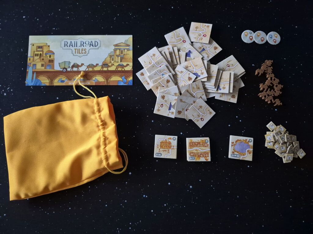 Spielmaterial der Wüsten-Erweiterung von "Railroad Tiles".