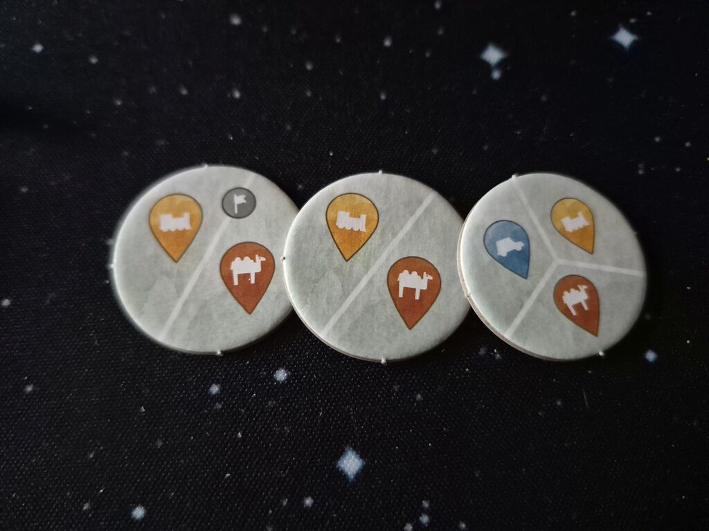 Drei Marker mit Symbolen.