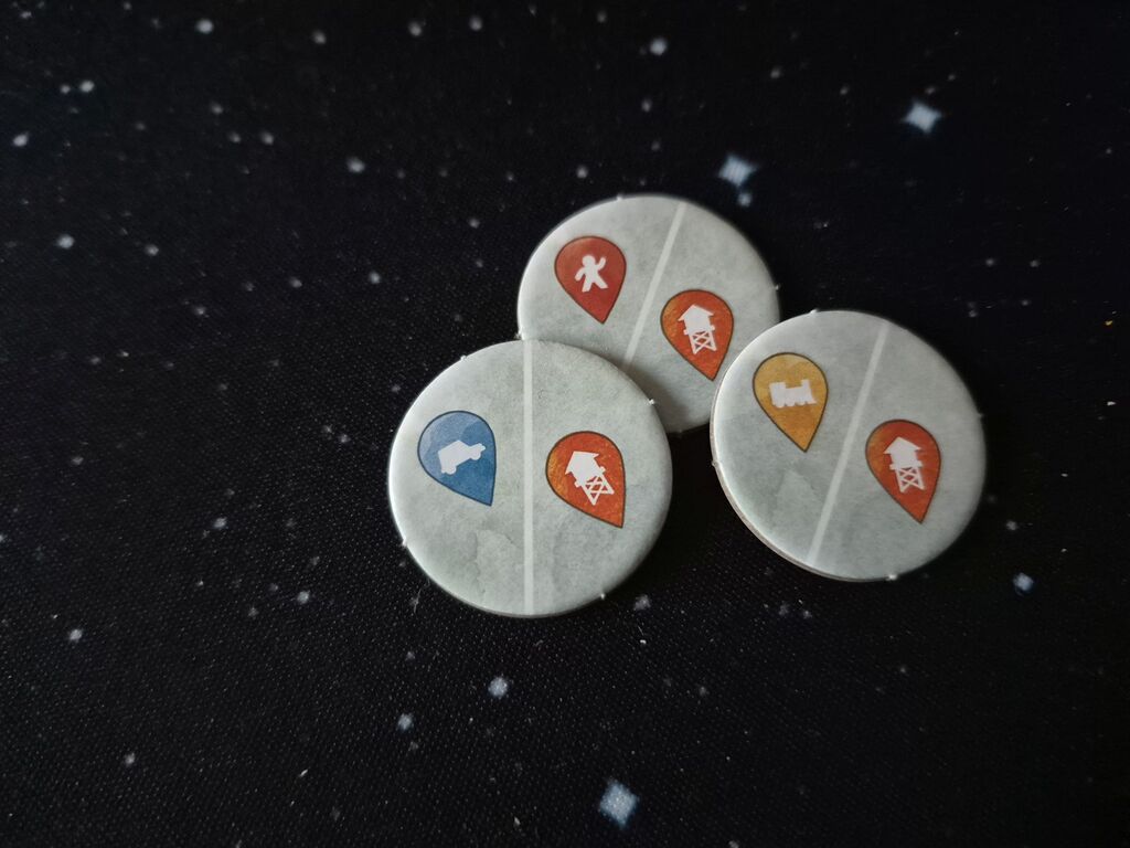 Drei Marker mit Symbolen.