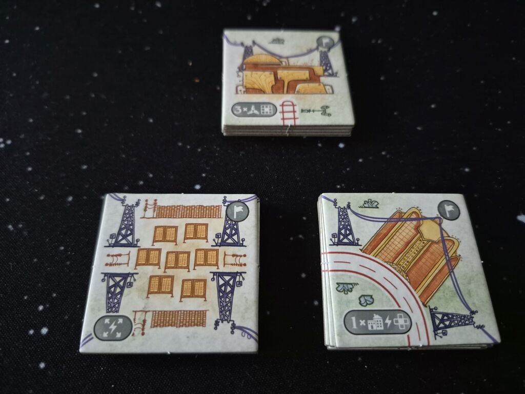 Drei Stapel Plättchen.