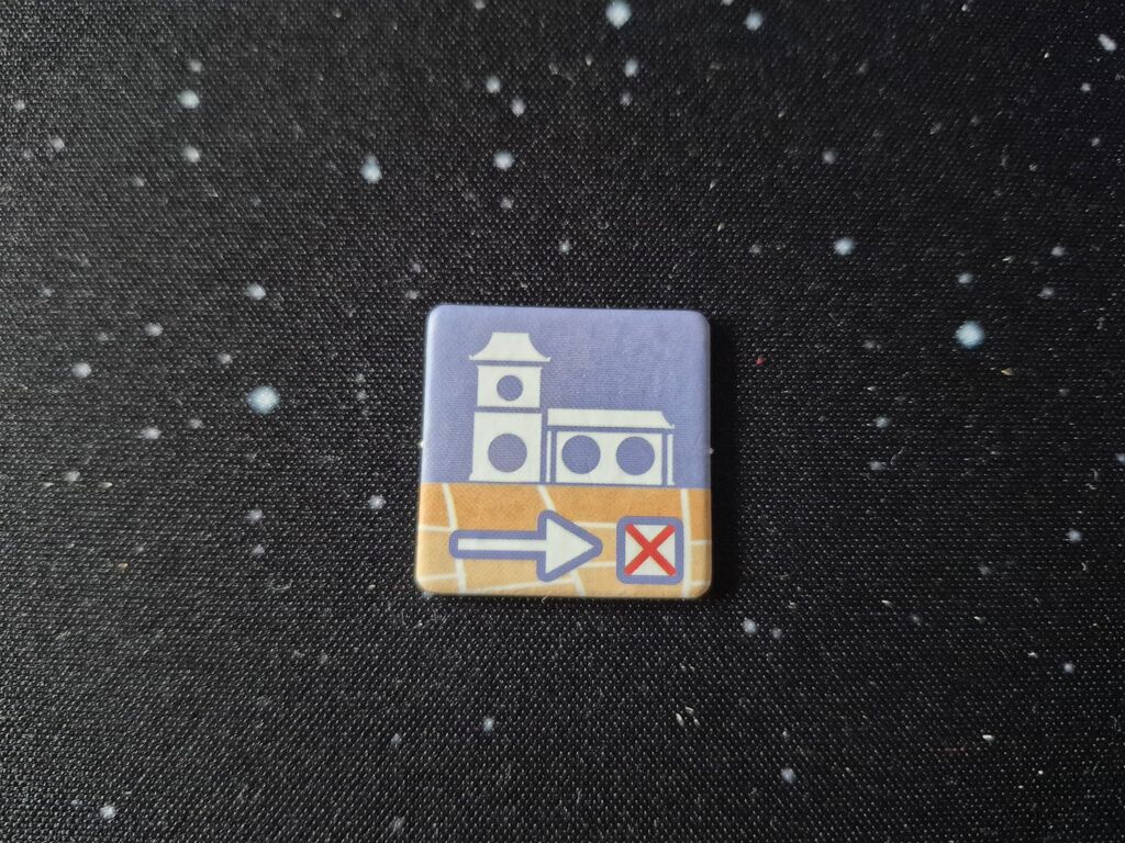 Ein Plättchen mit Symbol.