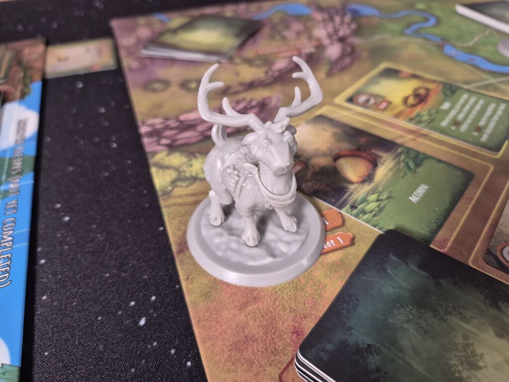 Hirsch-Spielfigur auf Spielplan von "Survivial of the Fattest".