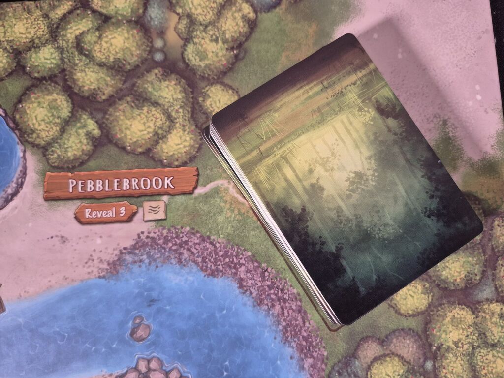 Anderer Kartenstapel auf Spielplan.