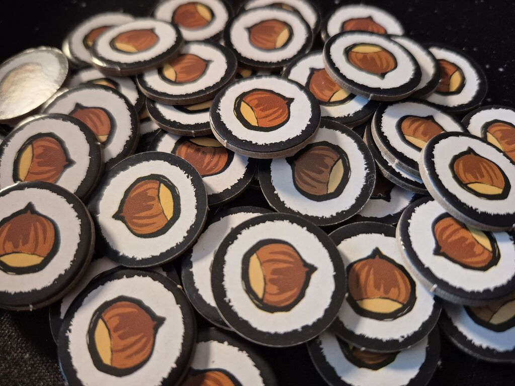 Marker mit einer Nuss.