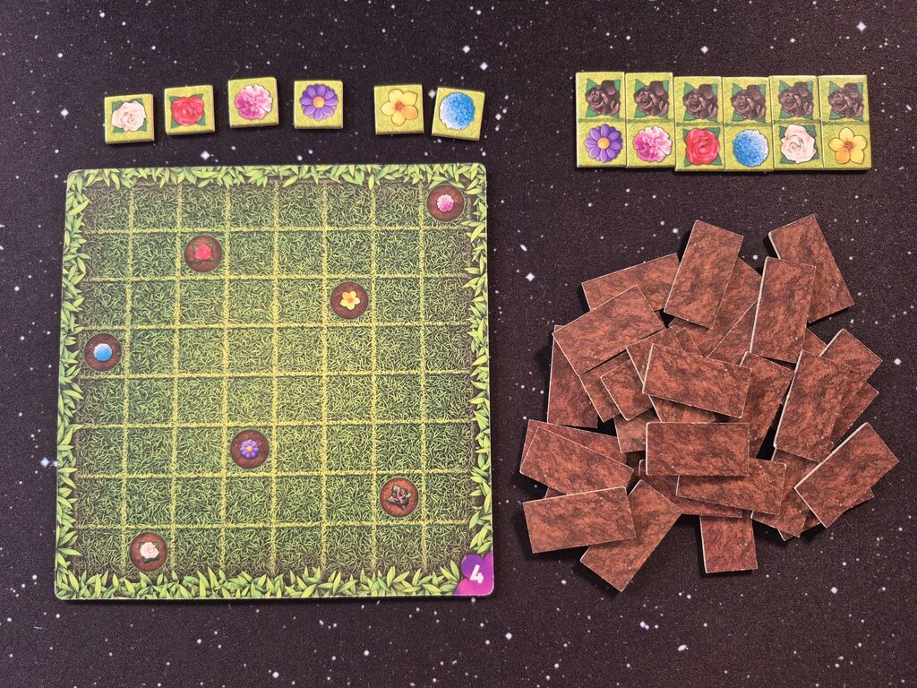 Spielmaterial mit vielen Plättchen.