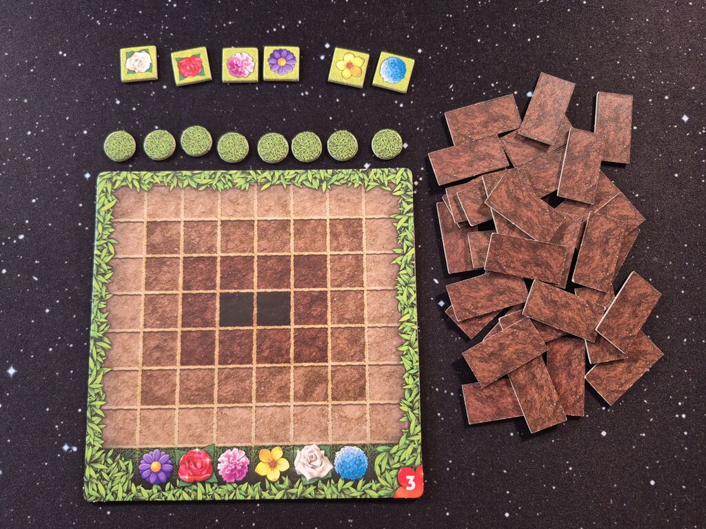 Spielmaterial mit vielen Plättchen.