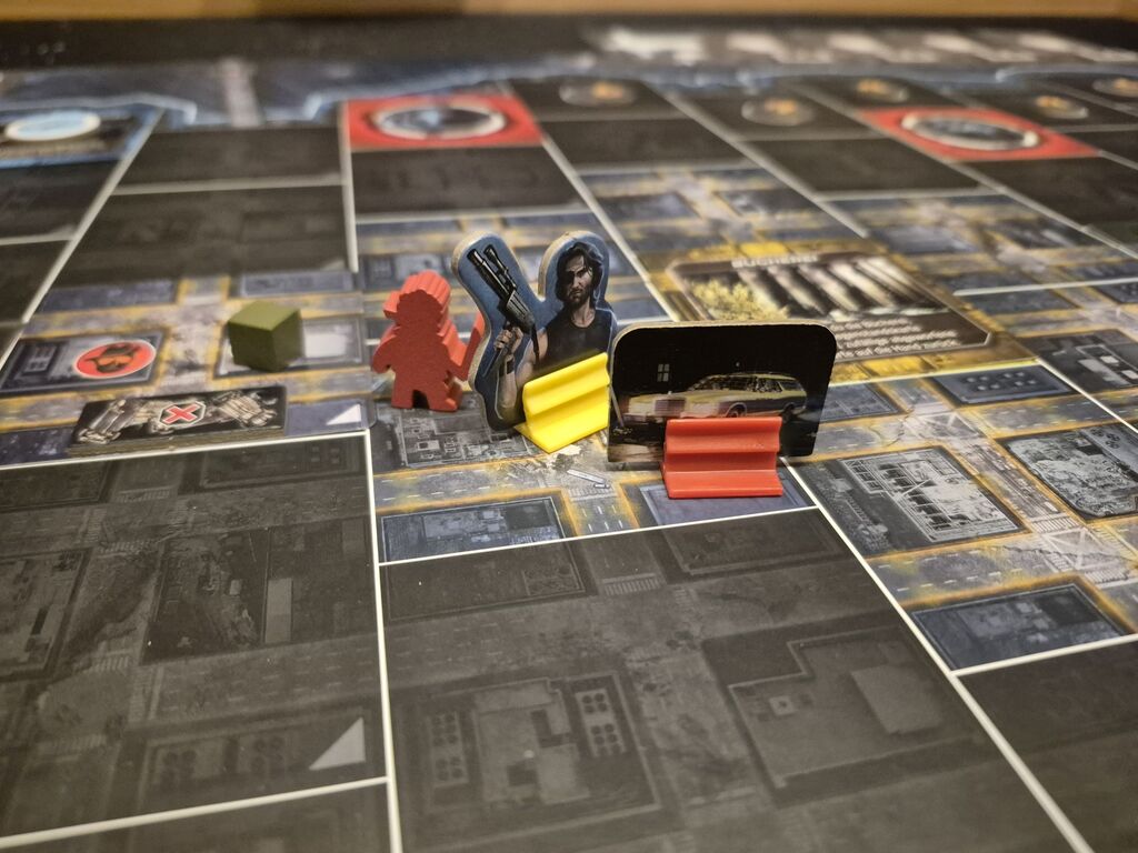 Spielfiguren auf dem Spielplan von "Die Klapperschlange".