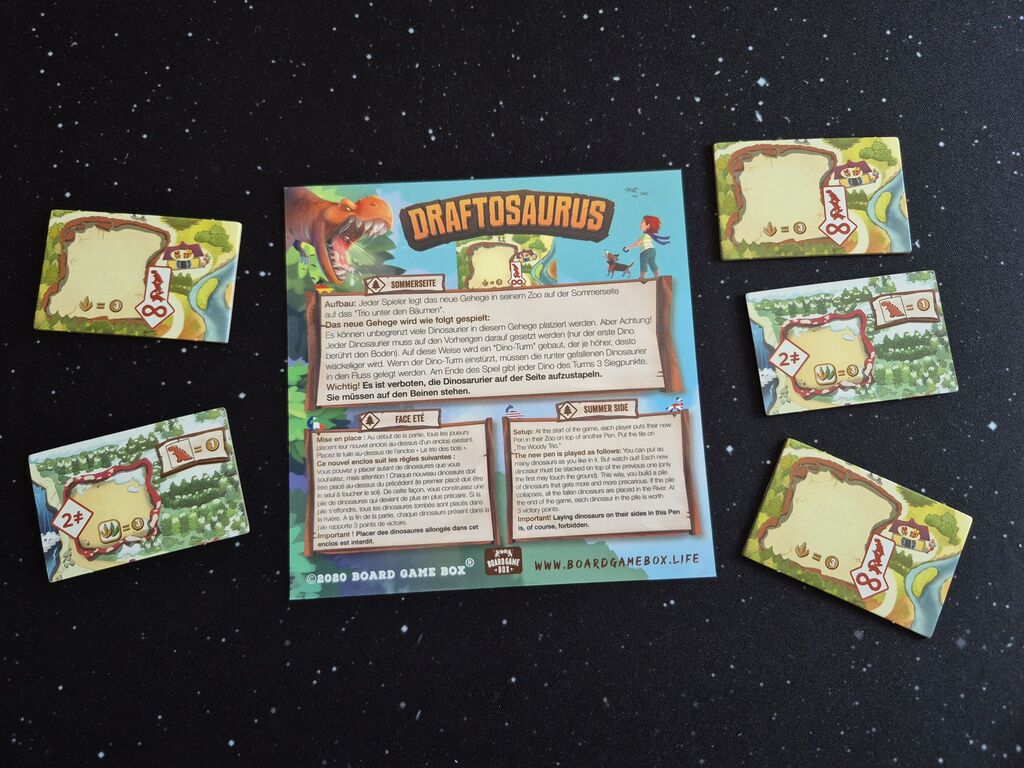 Spielmaterial der Mini-Erweiterung von "Draftosaurus".