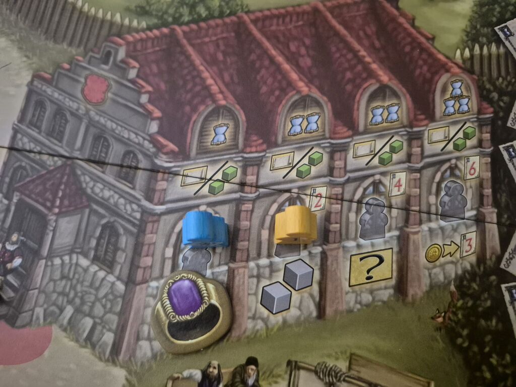 Spielplanausschnitt mit Meeple und vielen Symbolen.