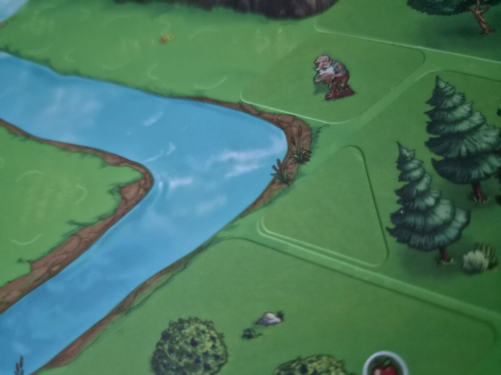 Aufkleber klebt auf Spielplan, verdeckt Symbol.