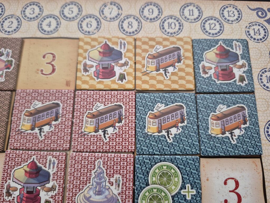 Plättchen auf Spielplan von "Calçada".