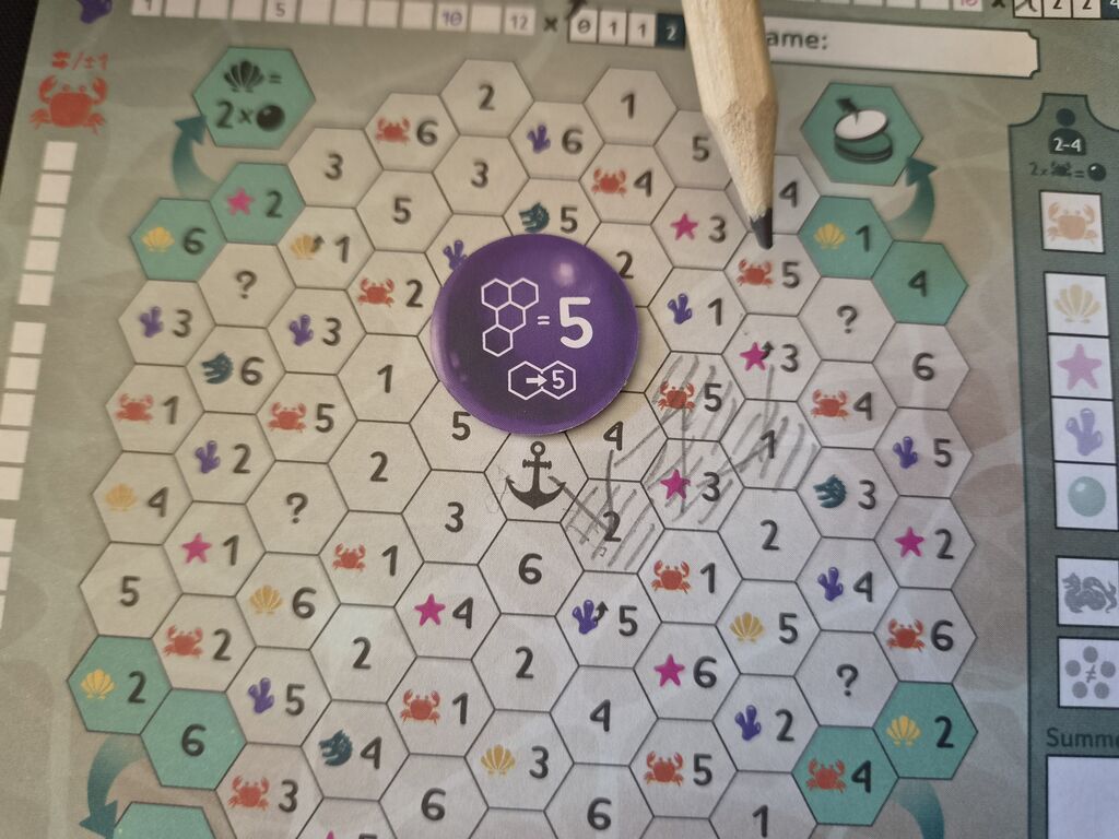 Runder Marker auf Spielplan.