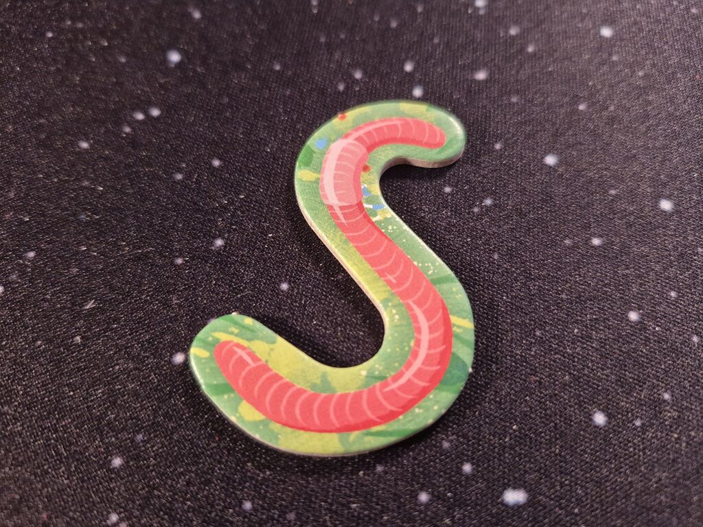 Marker mit Regenwurmform und -illustration.