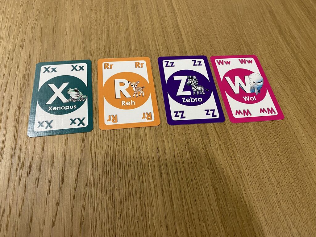 Karten mit anderen Tieren und Buchstaben.