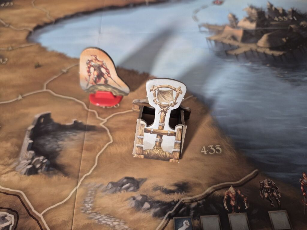 Spielfiguren auf Spielplan.