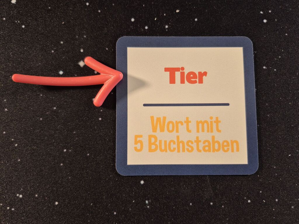 Pfeil zeigt auf das Wort "Tier" auf einer Karte.