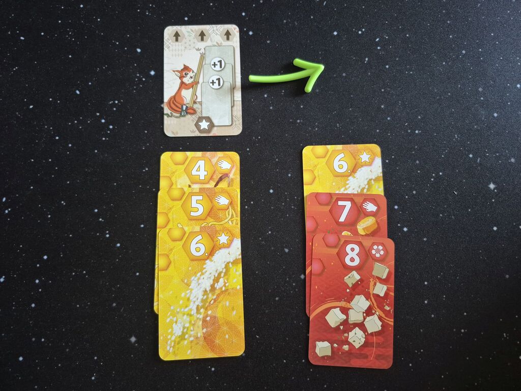 Karten mit Zahlen und eine mit Symbolen aus "Umami".