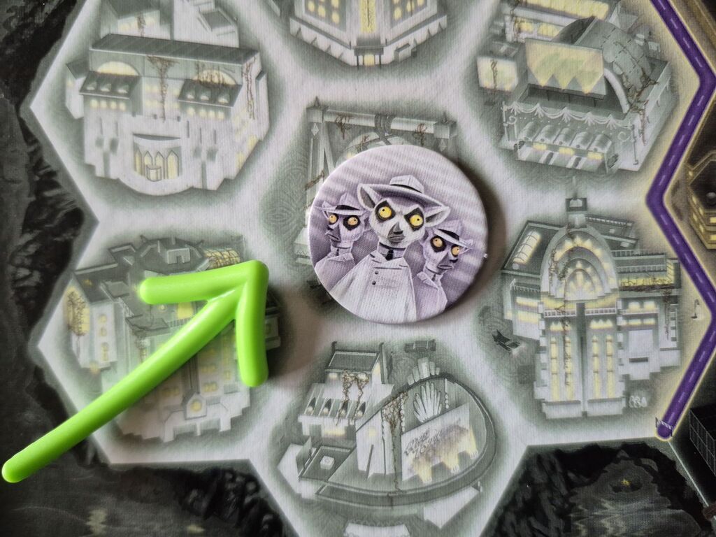 Marker mit Pfeil auf Spielplan.