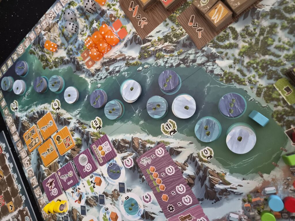 Plättchen auf Spielplan.