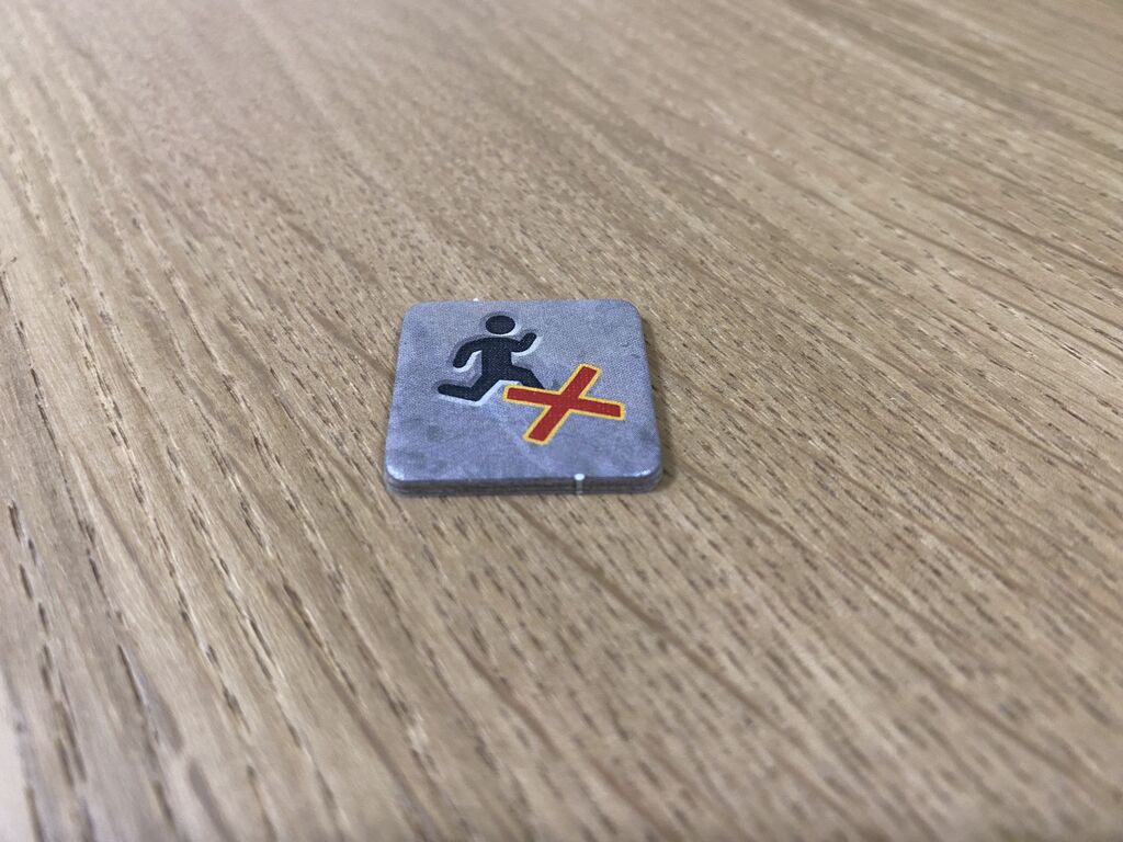 Plättchen mit Symbol.